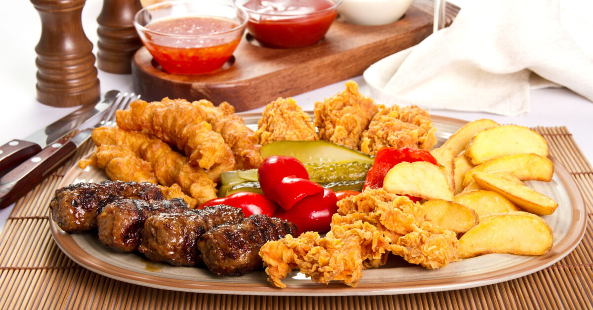 Mixed grilled and fried meat platter and pickles